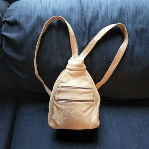 NWOT genuine leather sling backpack